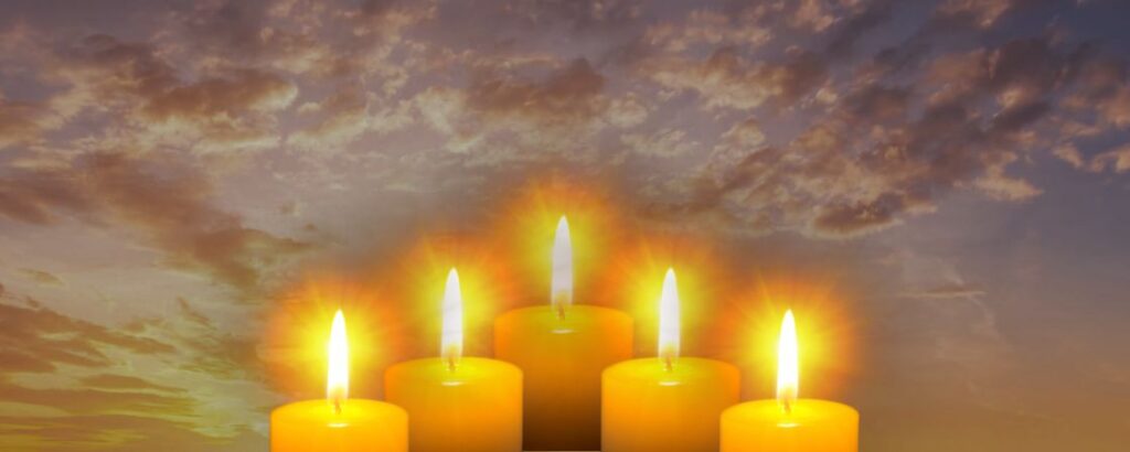 lit candles bundled