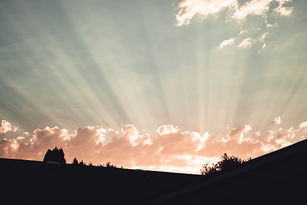 sun beam through clouds